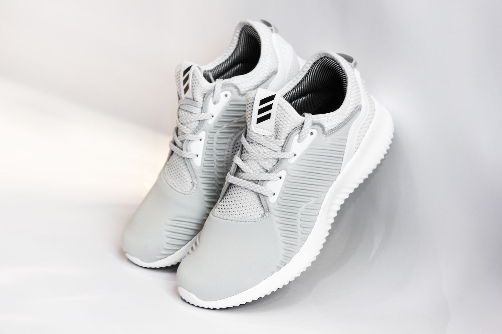 A pair of sneakers on a plain light background — the clean product-shot style Amazon requires.